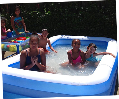 children in a little pool
